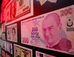 Emerging shares, currencies rise on dovish Fed