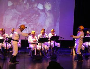 Choir of Turkish miners take stage for first time