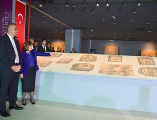 Returned Gypsy girl mosaic pieces on show