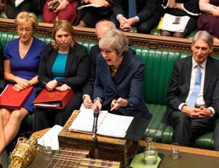 May survives confidence vote, seeks EU compromise to save Brexit deal