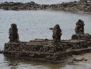 Drop in dam water levels reveals ancient village