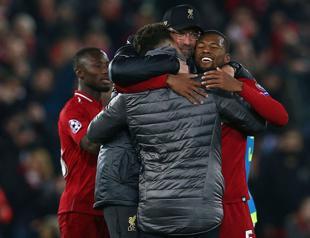 Charging Liverpool challenges Man City to prove its greatness