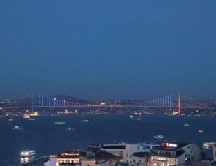 Istanbuls landmarks lit up in orange and blue to mark World Cancer Day
