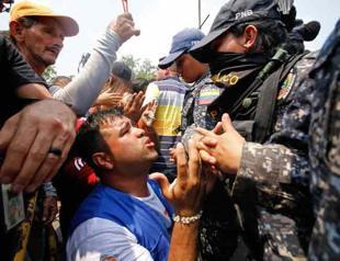 Venezuela standoff turns deadly as troops block aid delivery