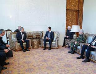 Russian defense minister hands to Assad message from Putin