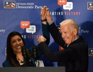 Biden bids to quell storm over campaign trail kiss