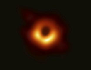 Scientists reveal first image ever made of a black hole