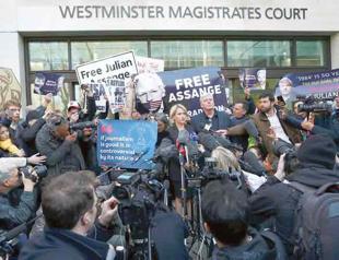 Assange held in London jail ahead of long legal fight