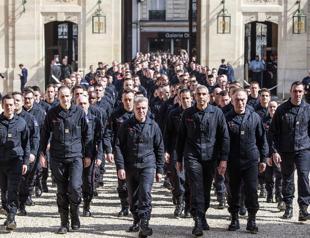 Paris honors exemplary firefighters for saving Notre-Dame