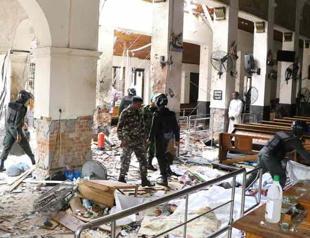 More than 290 dead as blasts hit Sri Lanka churches, hotels