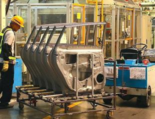 Industrial output rises 2.1 percent in March