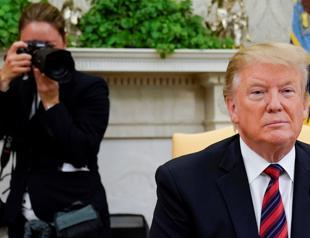 Trump ratchets up pressure on China, threatens tariff hikes