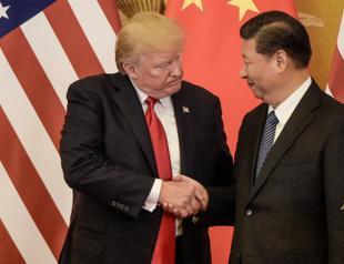 Trump and Xi to meet after defiant China hits US with new tariffs