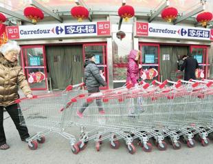 Carrefour agrees to divest its China business to Suning