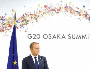 EUs Tusk lashes out at Putin on democracy