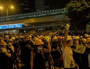 Tense calm returns to Hong Kong after protests erupt into violence