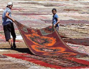 Sunlight gives hand-woven carpets pastel colors