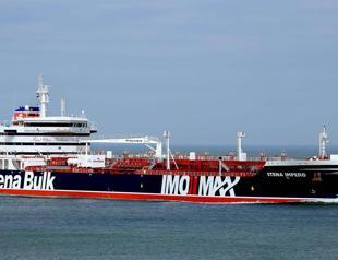 Iran probes British-flagged tanker seized after ’collision’
