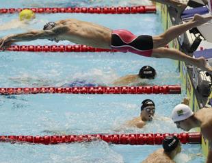 Dressel emerges with Phelps aura after scandal-hit world swim