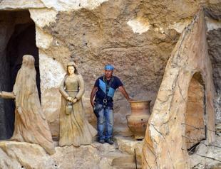 Artist adorns Egyptian cave church with biblical art