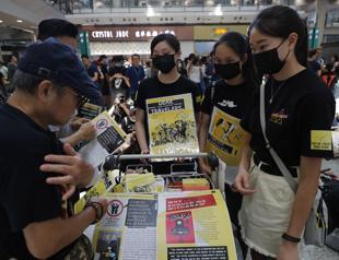 Protesters throng Hong Kong airport as property lobby calls for calm