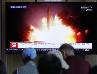 North Korea fires 2 missiles into sea