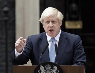 Defiant UK lawmakers move to bar no deal Brexit