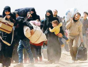 Turkey warns of new migrant wave in Europe