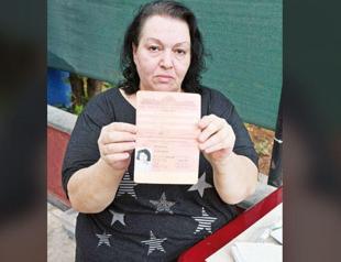 Woman holding USSR passport stuck in Turkey