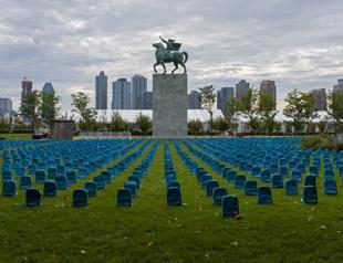 UN agency lays backpacks for every child killed in conflict