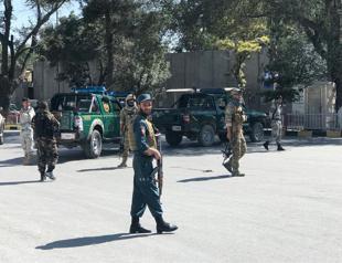 Blast kills dozens at Afghan election rally, aide says president unhurt