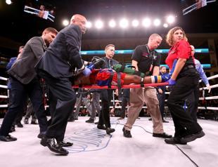 US fighter Day in coma after vicious KO