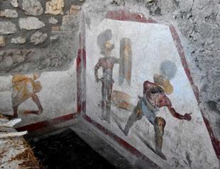 Vivid gladiator fresco discovered at Pompeii