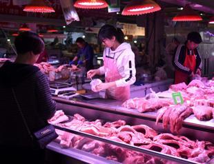China inflation surges as pork prices soar
