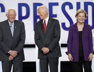 Debate rivals assail Warren as she joins Democrats’ top rank