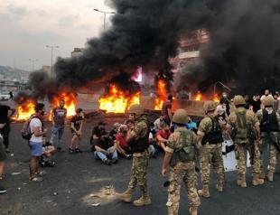 Lebanon scraps WhatsApp fee amid violent protests