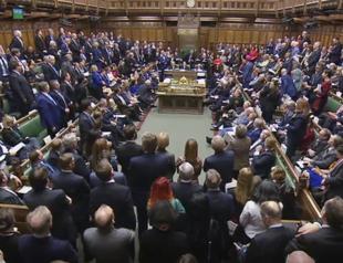 UK lawmakers to vote on whether to delay Brexit decision