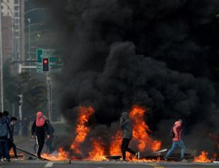 8 killed in Chile protests against metro price hikes