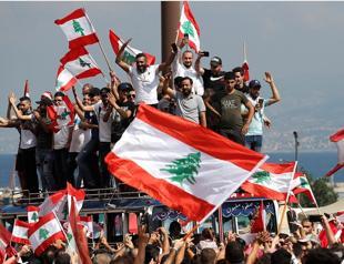 Lebanon set to cut ministers pay as protests engulf country
