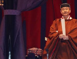 Japan’s monarch enthroned in ancient-style ceremony