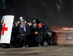 Chile Pinera faces new protests after firing ministers, courting working class