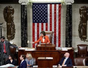 Trump impeachment effort passes first test in divided US Congress
