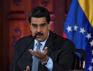 US issues some exemptions to Venezuela sanctions, targets more officials