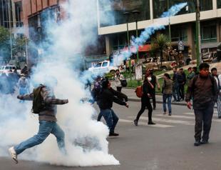 Clashes rock Bolivia as new interim leader challenged