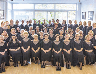 Choir members performing for 20 years together