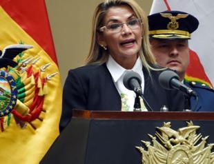 Bolivias interim president OKs bill for new elections