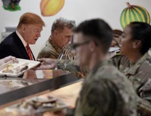 Trump hints new Taliban peace deal in Afghanistan visit