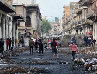 Injuries feared as police, protesters clash in Iraq