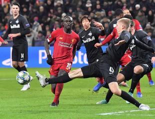 Liverpool, Napoli qualify for round of 16