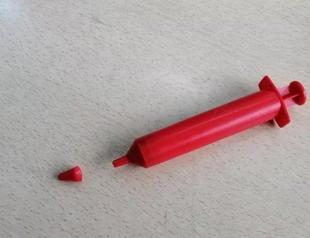 Two kids died from choking on the cap of a syringe-like chocolate tube